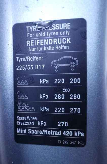 Opel Tire information sticker on car door